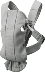 BabyBjörn Carrier Mini light gray front view for quick newborn closeness