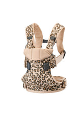 BabyBjörn Baby Carrier One in cotton beige/leopard, front view for all-day comfort.