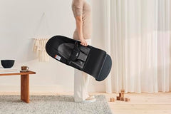 BabyBjörn Bouncer Balance Soft harness-locked view emphasizes secure seating.