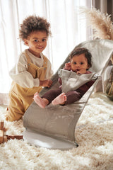 BabyBjörn Bouncer Bliss Mesh Gray Beige shows 4-position adjustability for growing babies.