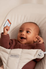 BabyBjörn Bouncer Balance Soft safety harness locked for secure newborn seating.