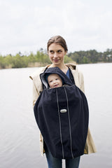 Soft fleece from BabyBjörn shields baby from cold wind and rain.