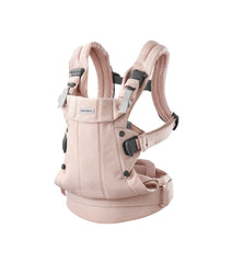 BabyBjörn Harmony light pink woven mélange closeup shows breathable mesh for baby comfort.