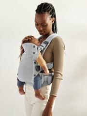 BabyBjörn Harmony padded shoulder straps shown for comfortable, secure baby carrying.