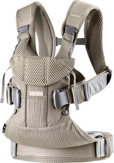 BabyBjörn One Air mesh close-up shows breathable fabric for baby comfort.