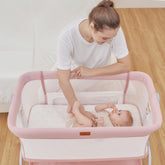 BabyBond bassinet side-sleeper assembled beside bed for easy nighttime soothing.