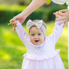 BABYGIZ headband light beige on baby demonstrates gentle fit and style.