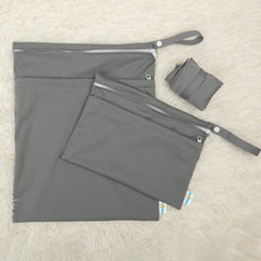 Babygoal wet bag with snap handle ready to hang on stroller or door.