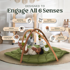 Babylicious oversized leaf-design play gym shown in nursery