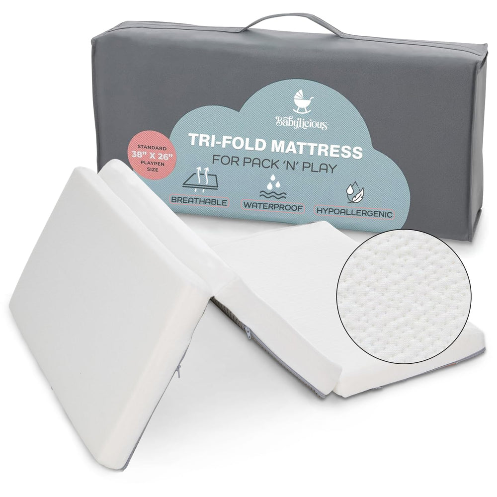 Babylicious pack-n-play mattress topper folded for easy travel and storage.