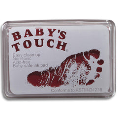 Baby's Touch pink handprint ink pad demonstrates safe, reusable prints for keepsakes.