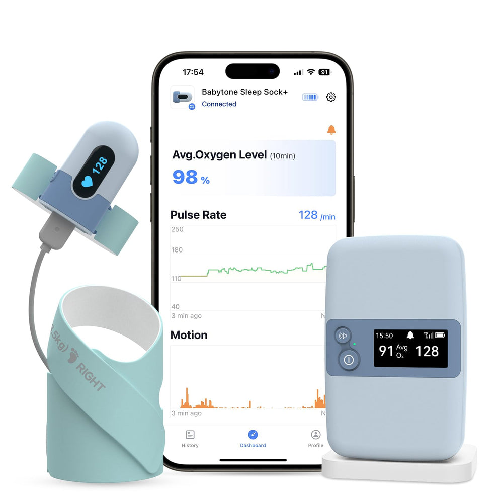 Babytone sleep monitor base station on nightstand with clear real-time alerts.