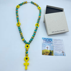 BAEAIEOU sunflower centerpiece adds sunny symbolism for a joyful first communion gift.