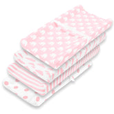 BaeBae Goods pink-white changing pad cover closeup showing secure elastic fit.