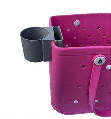 Bag Lady cup holder on Bogg Bag securely holds beverages for easy access.