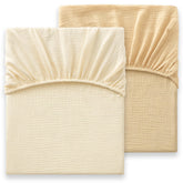 Bailix heavyweight muslin crib sheet cream closeup demonstrates durable fabric for long-lasting softness.