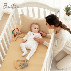 Bailix heavyweight muslin crib sheet snug-fit assembly highlights secure deep-pocket design.