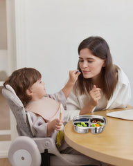 Bakpoco divided plate with lid on for easy on-the-go lunches.