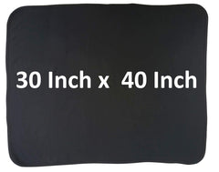 Bambini baby black blanket folded flat for compact travel and storage.