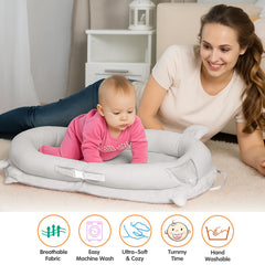 Banakshol baby lounger gray during tummy time to encourage head lift.