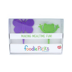 Child using BapronBaby Foodie Picks to practice independent feeding