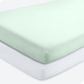 Bare Home 2-pack crib sheets in spring mint and white folded for easy storage and soft sleep.