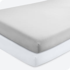 Bare Home 2-pack fitted crib sheets in cloud grey show elasticized stretch for snug crib fit.