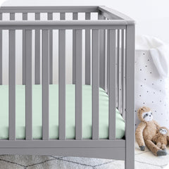 Bare Home 3-pack crib sheets folded together for easy nursery organization.
