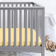 Bare Home 3-Pack Crib Sheet Morning Sun on mattress, breathable fabric promotes peaceful sleep.