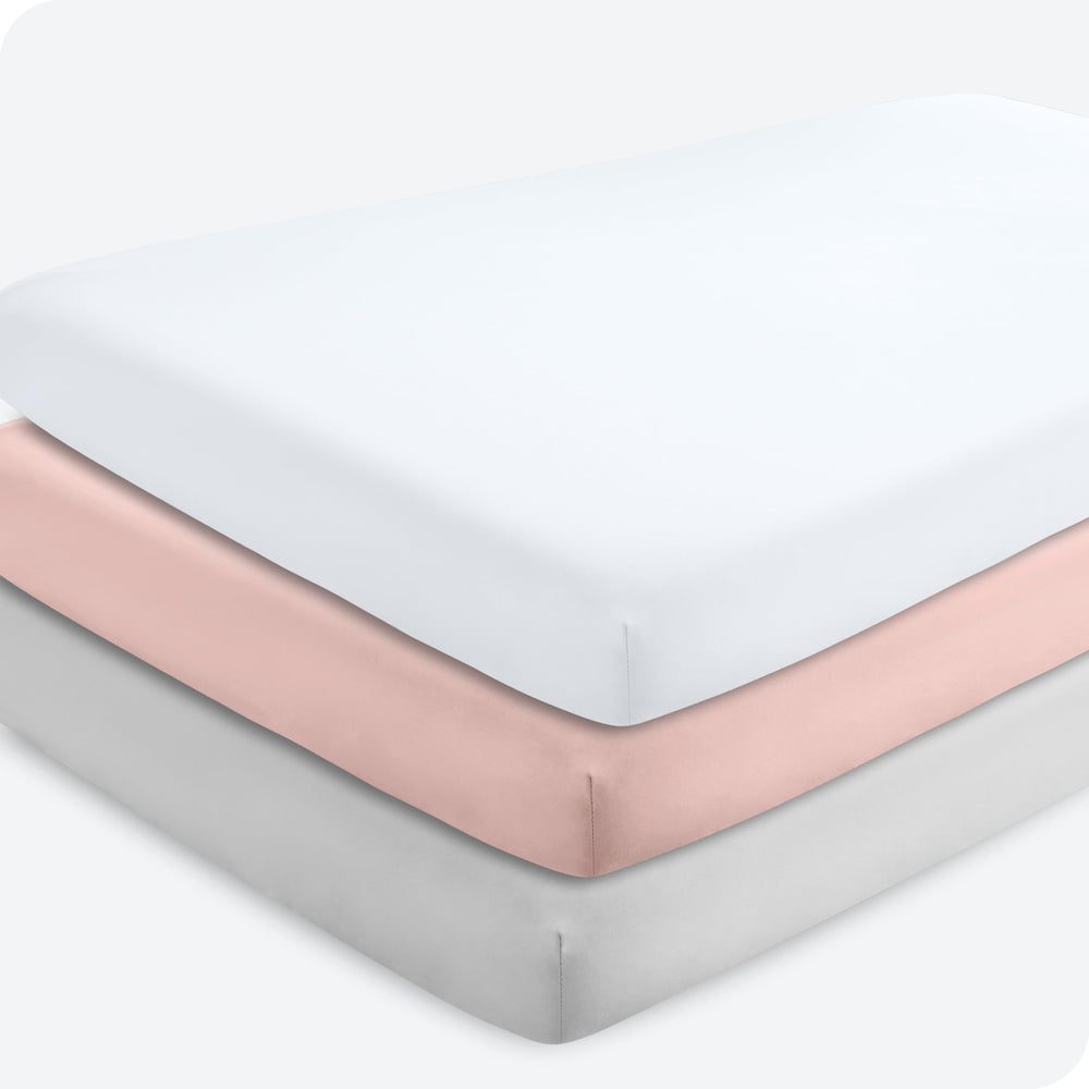 Bare Home pink slipper fitted crib sheet shows ultra-soft microfiber for gentle baby sleep.