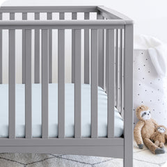 Bare Home crib sheets cloud grey pack in a nursery scene.