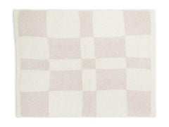 Barefoot Dreams CozyChic stroller blanket on baby showcases soft high-pile fabric for cozy outings