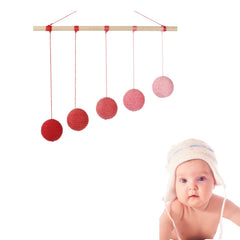 Barley Zone Octahedron mobile; bold primary colors aid color discrimination in weeks 5-8.