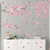 Barri Design Cherry Blossom wall sticker pink tree branch creates playful nursery decor.