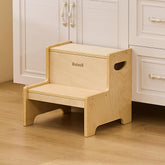 Bateso step stool near toilet supports potty training with sturdy wooden design