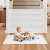 BBsecure retractable baby gate on stairs, closed for secure passage.