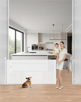 BBsecure Upgraded Retractable Gate installed across a doorway showing 71-inch width and white finish for child-safe spaces