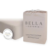 Bella Coterie bamboo crib sheet close-up reveals silky softness for baby sleep comfort.