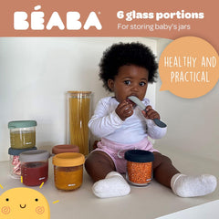 BEABA Sunrise jars pour closeup shows easy pouring with secure lid seal
