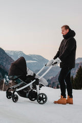 BEABA stroller gloves zip-fasten for a secure fit on any stroller bar.