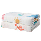Beach Fun surfboards swaddle blanket shows ultra-soft bamboo-cotton fabric for gentle newborn cuddles