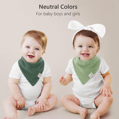 Bearmoss muslin bib used as burp cloth—soft, absorbent, multi-use accessory.