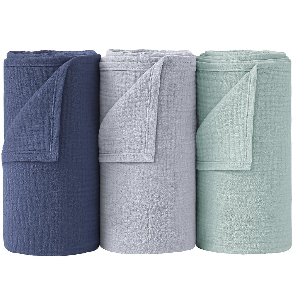 Bearmoss muslin swaddle blue-green closeup shows soft cotton and breathable weave for gentle skin and sleep support
