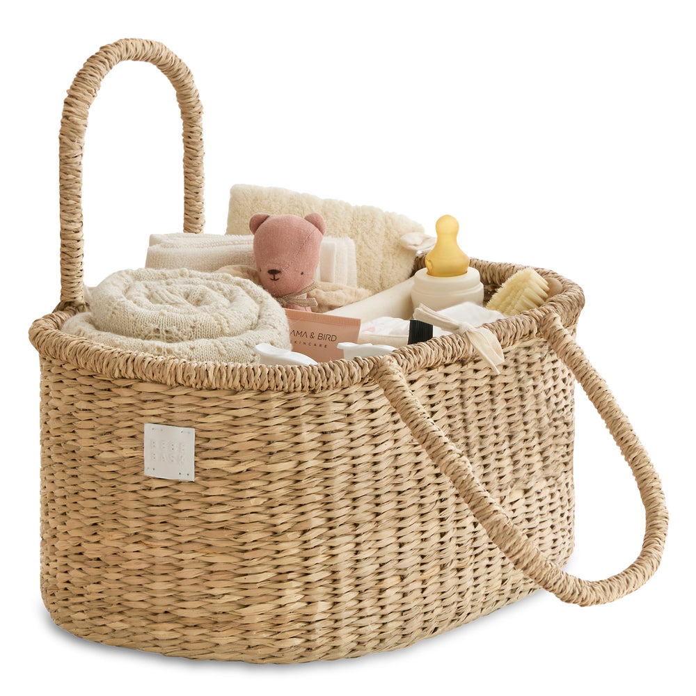 BEBE BASK diaper caddy seagrass basket shows artisan weave for stylish nursery organization.