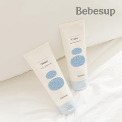 BEBESUP organic rice-infused cream jar highlighting gentle daily nourishment for delicate skin.