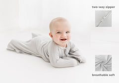 bebon Transition Swaddle CozyGrey small 4-8 month baby sleeping in wearable blanket.