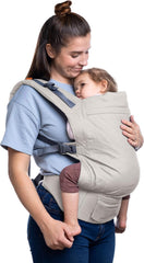 Beco Toddler Carrier wide-seat in ecru provides ergonomic support for growing children.