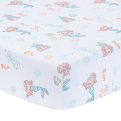 Bedtime Originals Disney Baby Ariel crib sheet pattern promotes cozy bedtime routine.