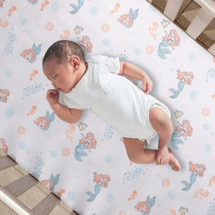 Bedtime Originals Disney Baby Ariel with Flounder watercolor accents for gentle nights.