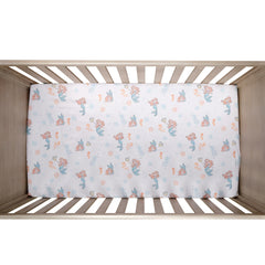 Bedtime Originals Disney Baby Ariel seahorses and shells create a calm nursery.